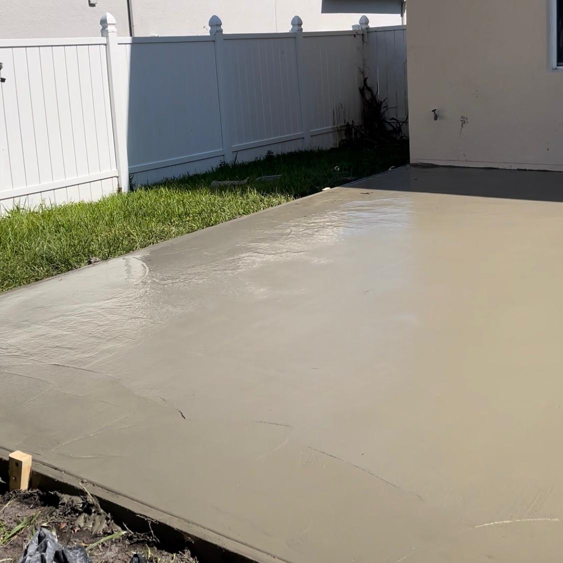 Residential concrete driveway in Clermont by FB Solutions