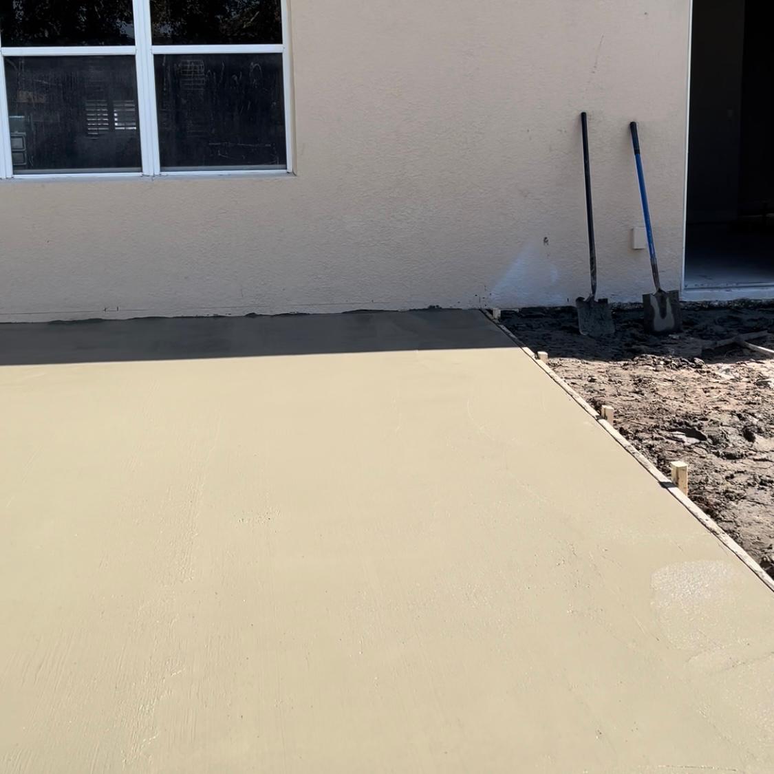 Concrete patio installation in Groveland by FB Solutions